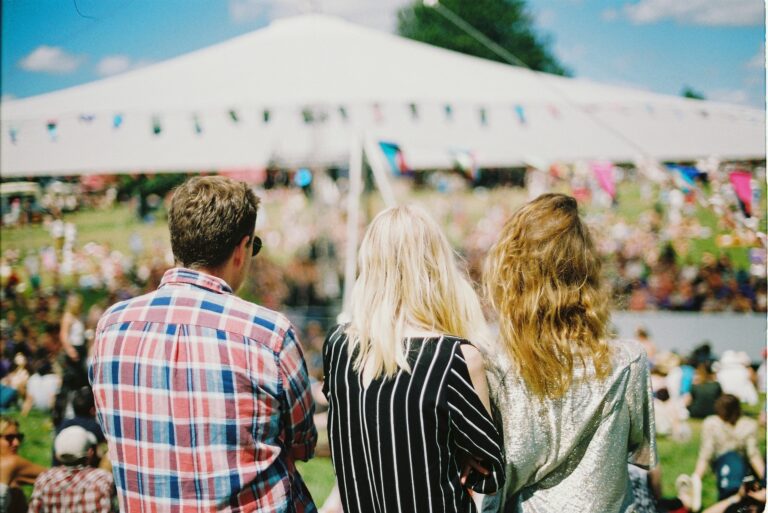 People standing at one of many outdoor festivals in Charleston SC